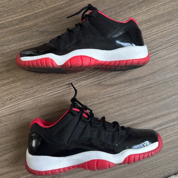 AIR JORDAN 11 RETRO LOW BG size 4Y black and red - Picture 1 of 9